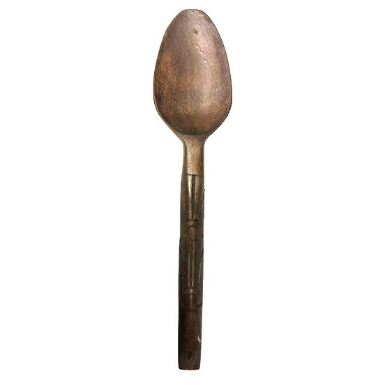 Grande cuillère en bois sculpté